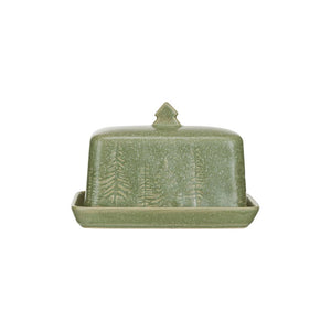 The DEBOSSED STONEWARE BUTTER DISH by CREATIVE COOP is a green stoneware butter dish that includes a lid adorned with embossed tree designs and features a small tree-shaped handle. It is expertly crafted from debossed stoneware and finished with a matte reactive glaze.