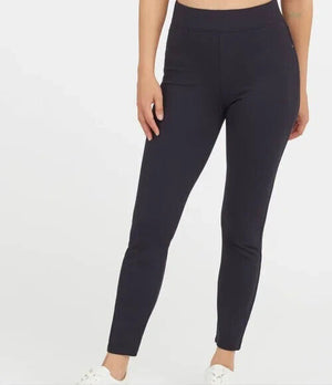 The SPANX Perfect Pant Ankle 4 Pocket leggings in black are showcased on a white background. These women's leggings, made from smoothing ponte fabric, feature a high waistband and a sleek ankle backseam skinny silhouette with a convenient pull-on design for effortless style.