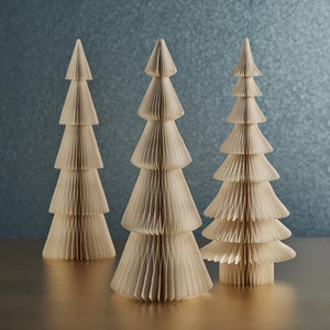 The WISH PAPEER DECORATIVE TREE - ALPINA 24IN by ZODAX is a charming small paper sculpture that captures the essence of a Christmas tree with its tiered, conical layers and accordion-style pleats. Ideal for adding festive cheer, this decorative piece stands elegantly against a plain white background, making it a delightful addition to any space.