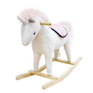 The WONDER AND WISE ASWEETS UNICORN ROCKER features a white fabric unicorn with a unicorn horn, light pink mane and tail, and a light pink saddle. Mounted on a wooden rocker base, it includes magical details such as stitched eyes and a small side pocket for added comfort.