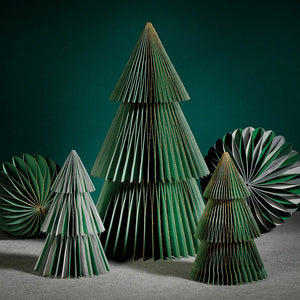 The product description showcases the "Wish Paper Tabletop Tree Green with Gold" by Zodax, resembling a Christmas tree crafted from green paper. It features multiple folded layers creating a symmetrical, geometric pattern. Ideal for holiday decor, its compact size allows it to sit gracefully on any plain white background.