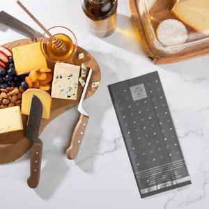 A white box featuring text and illustrations, branded "FORMATICUM" at the top, with three small icons of a goat, cow, and sheep beneath it. The product is identified as "FORMATICUM - REUSABLE CHEESE STORAGE BAGS," designed to maintain freshness. It contains 10 bags and measures 10" x 16" (25 cm x 41 cm).