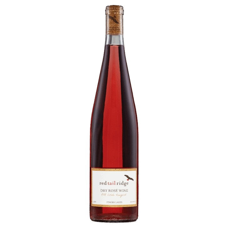 A tall, clear bottle of RED TAIL RIDGE ROSÉ 2024 from WINE: OCEAN SOUTH IMPORTS—this dry rosé shows a deep pink-red hue. The bottom label features the brand name and product information.