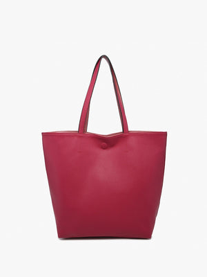 The TWO TONE REVERSIBLE TOTE by JEN & CO is displayed against a plain white background, featuring a red leather design with two handles. Its elegant two-tone appearance and subtly textured surface enhance the versatility and style it brings to any outfit.