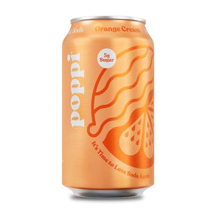 The product shown is a can of POPPI - ORANGE CREAM soda. The can features an orange background with a design that includes an orange slice and a cream swirl. It emphasizes "5g Sugar" and the motto "It’s Time to Love Soda Again" at the bottom. The brand name "POPPI" is prominently displayed, along with benefits for digestive health provided by natural prebiotics from Apple Cider Vinegar.