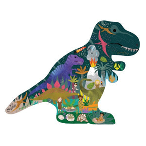 A vibrant dinosaur puzzle box shaped like a green dinosaur showcases a roaring blue and purple Tyrannosaurus. The box features labels reading "ROAR" and "Dinosaur Puzzle," contains 40 chunky puzzle pieces, and is branded by Floss & Rock.