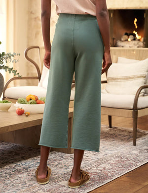 The FRANK & EILEEN CATHERINE FAVORITE SWEATPANT in rosemary features wide legs, an elastic waistband with a drawstring tie, and is made of cozy triple fleece fabric. Displayed on a white background.