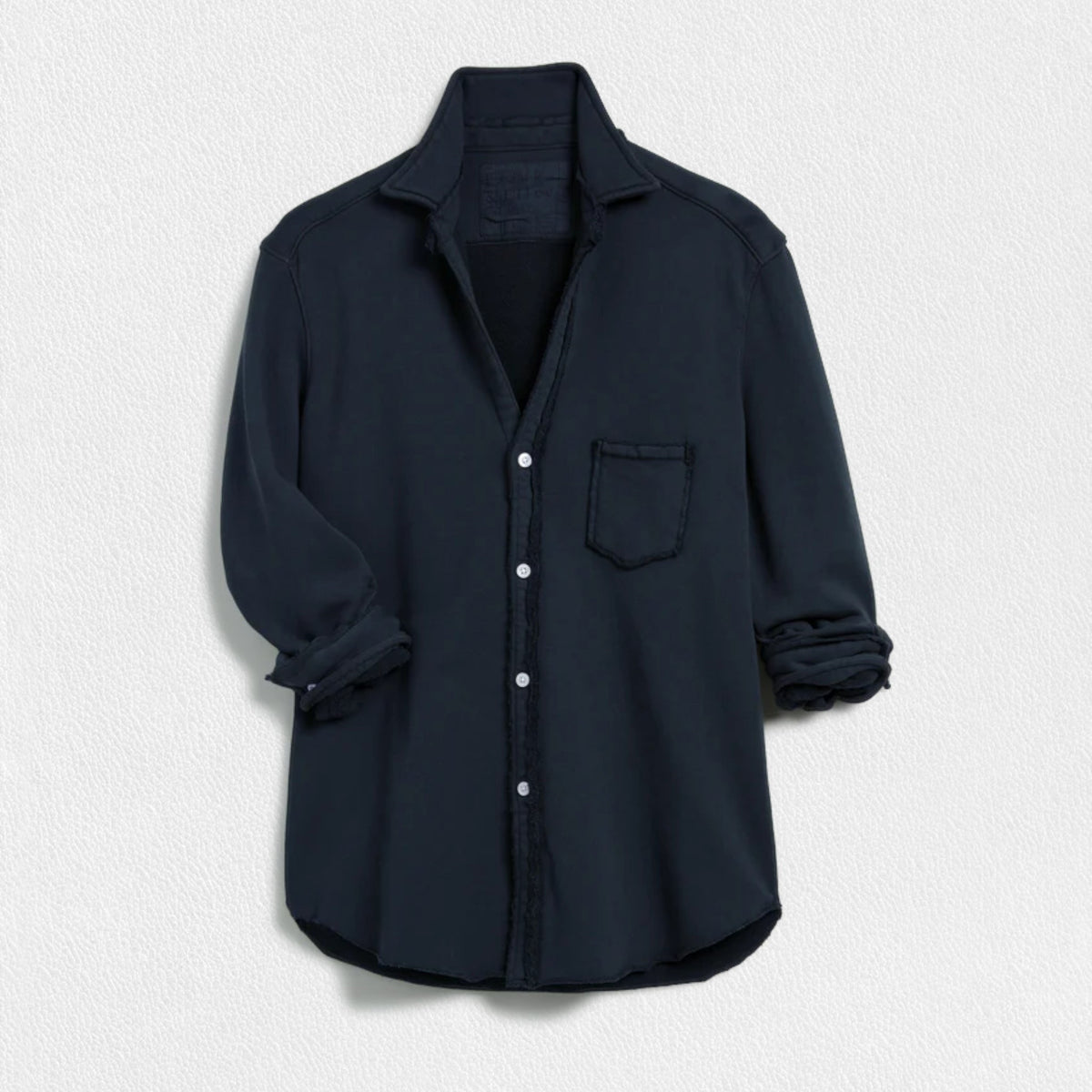 The FRANK &amp; EILEEN Eileen Relaxed Button Up in Triple Fleece British Royal Navy showcases bust-flattering button placement, long rolled-up sleeves, and a chest pocket. Set against a light textured background, it offers classic style and ultimate comfort.