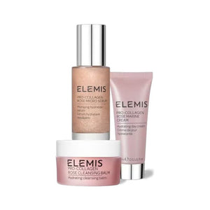 A teal and gold box from ELEMIS - STEINER contains the Pro-Collagen Rose Isons, featuring three skincare essentials: a small jar of Pro-Collagen Cleansing Balm, a pump bottle of Pro-Collagen Marine Cream for ultimate hydration, and a tube. The interior of the box boasts a textured pattern, adding an elegant touch to your daily routine.