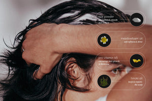 A sleek black bottle of JACK HENRY - HAIR FOAM, featuring minimal white text on the front, casts a shadow on a white background.