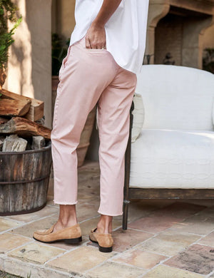 The FRANK & EILEEN - THE WICKLOW ITALIAN CHINO IN VINTAGE ROSE is displayed against a neutral background. These pants feature a slim fit design with front pockets, belt loops, and a small tag with the brand name "Frank" visible at the waistband.