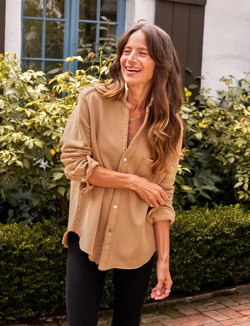 FRANK & EILEEN's EILEEN RELAXED SWEATSHIRT BUTTON UP offers a tan button-up shirt with rolled-up sleeves, a single chest pocket, and turned-up collar. Its textured fabric presents a casual, comfortable, bust-flattering look.