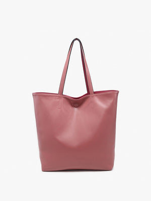 The TWO TONE REVERSIBLE TOTE by JEN & CO is displayed against a plain white background, featuring a red leather design with two handles. Its elegant two-tone appearance and subtly textured surface enhance the versatility and style it brings to any outfit.