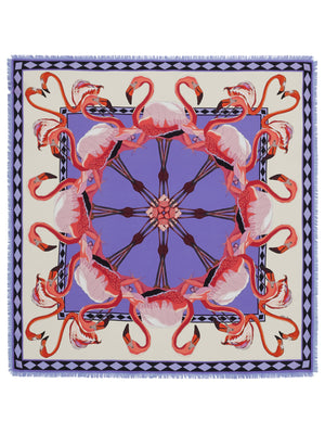 The FRANCO FERRARI - CIALDA DOUBLE SIDED FRINGE SILK SCARF 90CM, made of 100% silk, features a vibrant double-sided pattern in green, pink, orange, white, and brown hues. This colorful scarf can be folded into a triangle and tied at the top and is finished with fringed edges.