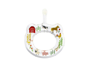 The HAMICO Baby Toothbrush Farm Animals, designed by dentists and brought to you by HAMICO/INNOVATIVE TOOTHBRUSH, features a white child-sized seat with a handle adorned with colorful illustrations of farm animals including cows, horses, chickens, pigs, and sheep. It also includes images of a red barn and green plants to make it visually engaging for young children.