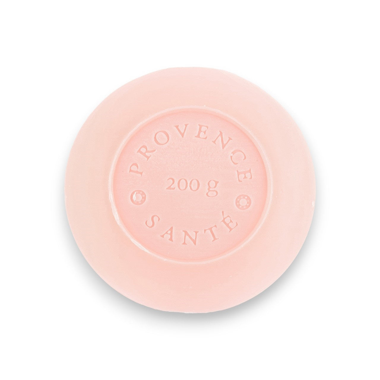 A round, pale pink bar of French-milled soap from Baudelaire, embossed with "Provence Santé" and "200 g", infused with the essence of wild rose. This luxurious bath bar is part of the Baudelaire Wild Rose collection and comes in a 7 oz boxed presentation.