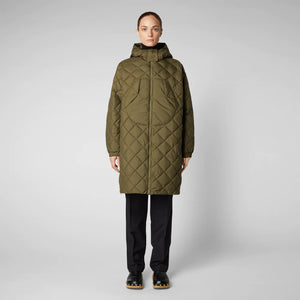 A person wearing the SAVE THE DUCK - VALERIAN PUFFER COAT in olive-green from the Recycled collection, along with a hood, black gloves, sunglasses, a bucket hat, black pants, and clogs. They are standing sideways and looking at the camera against a plain gray background.