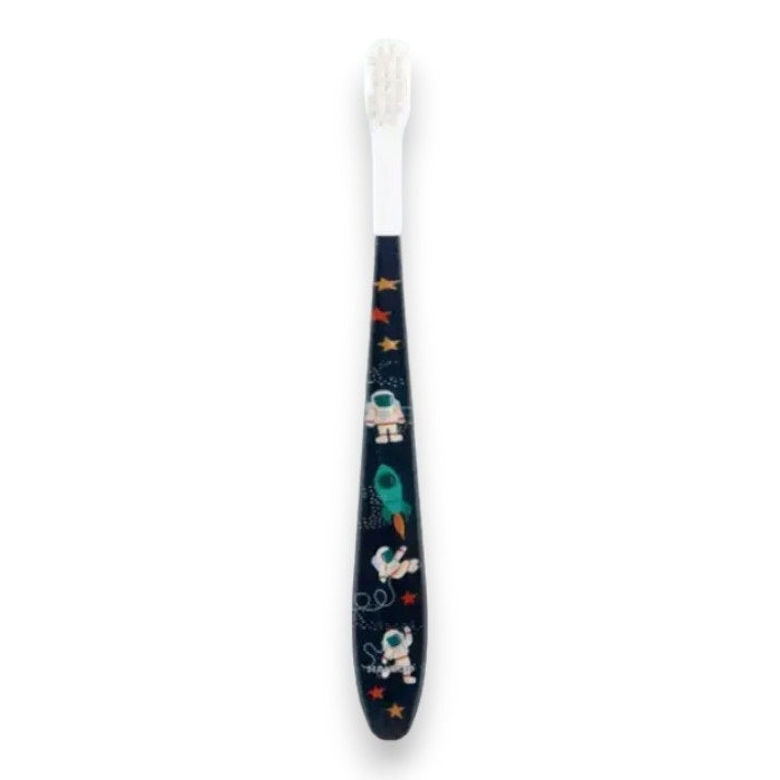 The HAMICO - KIDS ASTRONAUT TOOTHBRUSH by HAMICO/INNOVATIVE TOOTHBRUSH is a black, dentist-designed kids&#39; toothbrush with soft white bristles, adorned with colorful space-themed illustrations of astronauts, rockets, stars, and planets.