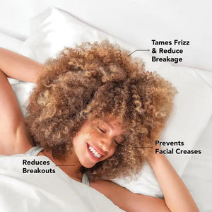 A satin pillowcase with a beige and white leopard print design is displayed against a plain background. To the right of the luxurious pillowcase is its packaging, which reads "SATIN PILLOWCASE" by KITSCH and highlights its 600-thread count and benefits for frizz-free hair and healthy skin.