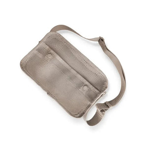 The LAMBWOLF COLLECTIVE - FORAGER DOG BUM BAG is a beige crossbody sling bag featuring a stylish mesh design on the front. It comes with a long, adjustable strap secured by a buckle. The front of the bag includes snap buttons for closure along with a quick-access pouch and is made from lightweight, durable material.