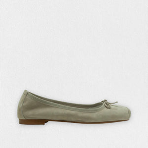 The MICHELE LOPRIORE - PALOMA ballet flat with a square toe, crafted from genuine silver leather, features a delicate bow on the front and a low-profile brown sole. Made in Italy, this elegant shoe is set against a plain white textured background.