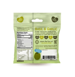 A light green packet of OLOVES - BASIL & GARLIC natural green pitted Greek olives by POSHI, flavored with basil and garlic. The packaging showcases a cartoonish olive graphic and emphasizes: "Low Calorie Snack," "New Greek Olives," "Kids & Adults Love 'Em," "Gluten-Free Vegan Snacks," and "30g | 1.1oz.