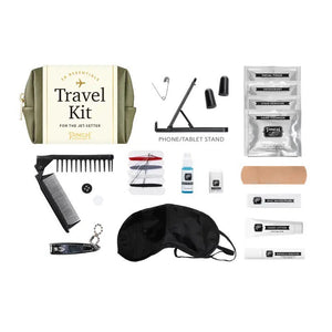 The PINCH PROVISIONS - Unisex Travel Kit from PINCH PROVISIONS, contains various travel accessories including a black sleep mask, comb, nail clipper, safety pin, thread and needle set, earplugs, deodorant wipes, face tissues, breath drops, hand lotion, bandage, and a phone/tablet stand.