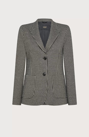 The SEVENTY Stretch Jacquard Vichy Jacket by SEVENTY is a tailored women's blazer featuring a classic black and white houndstooth pattern. Made in Italy, it boasts a notched lapel, two large black buttons for closure, and front flap pockets. The inner lining is dark grey, complementing its overall structured design.