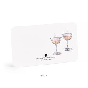 A watercolor illustration of two champagne glasses filled with bubbly liquid, elegantly rendered on a white rectangular notecard with rounded corners. The FLYING CORK LITTLE NOTES feature the text "Little Notes by E.FRANCES PAPER" and "Please Recycle Me" at the bottom.