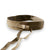 Introducing the ADA - WRAP LEATHER BELT by ADA, a wide, beige belt crafted from luxurious leather. It features long, dangling ends that are looped to form an overlapping knot at the front. Designed for comfort and style, it feels smooth against the skin and adds a touch of elegance to any outfit. Photographed against a plain white background for clarity and focus.