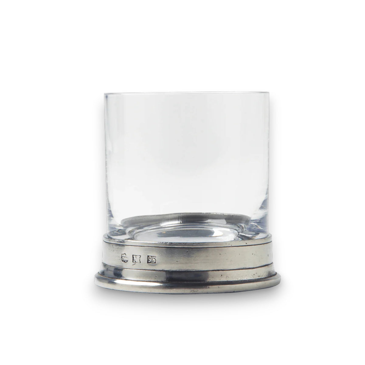 The MATCH - PEWTER ROCKS GLASS by MATCH features a clear tumbler with a wide, flat Italian pewter base and hallmark accents, shown on a plain white background.