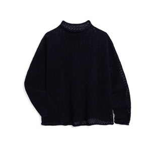 The FRANK & EILEEN MONTEREY Pointelle Rolled Funnel Neck Sweater in Marine features a loose, textured Italian pointelle knit, long sleeves, high rolled neckline, and is crafted from 100% cotton. Shown laid flat on a white background.