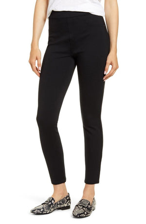 The SPANX Perfect Pant Ankle 4 Pocket leggings in black are showcased on a white background. These women's leggings, made from smoothing ponte fabric, feature a high waistband and a sleek ankle backseam skinny silhouette with a convenient pull-on design for effortless style.