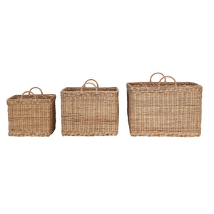 Three RATTAN BASKET WITH HANDLES (MEDIUM) by CREATIVE COOP of varying sizes are shown side by side. The light brown baskets, featuring two small handles on top for easy carrying, offer an eco-friendly storage solution. Each basket is slightly larger than the one next to it, perfect for bohemian decor.