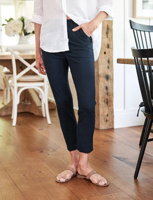 The FRANK & EILEEN - MURPHY BILLION DOLLAR PANT is laid flat against a white background. These black dress pants feature a straight-leg cut, with side pockets and a waistband adorned with belt loops. The fabric appears smooth and slightly stretchy, making them perfect for transitioning from the boardroom to cocktails.