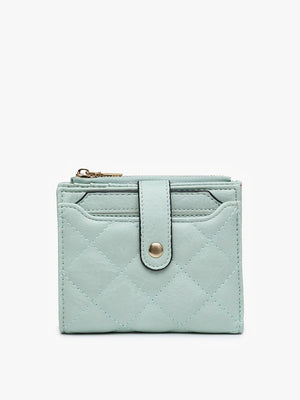 The QUILTED ZIP TOP WALLET by JEN & CO is a teal, small, quilted vegan leather wallet featuring a gold snap closure and a zippered compartment at the top, all set against a plain white background.