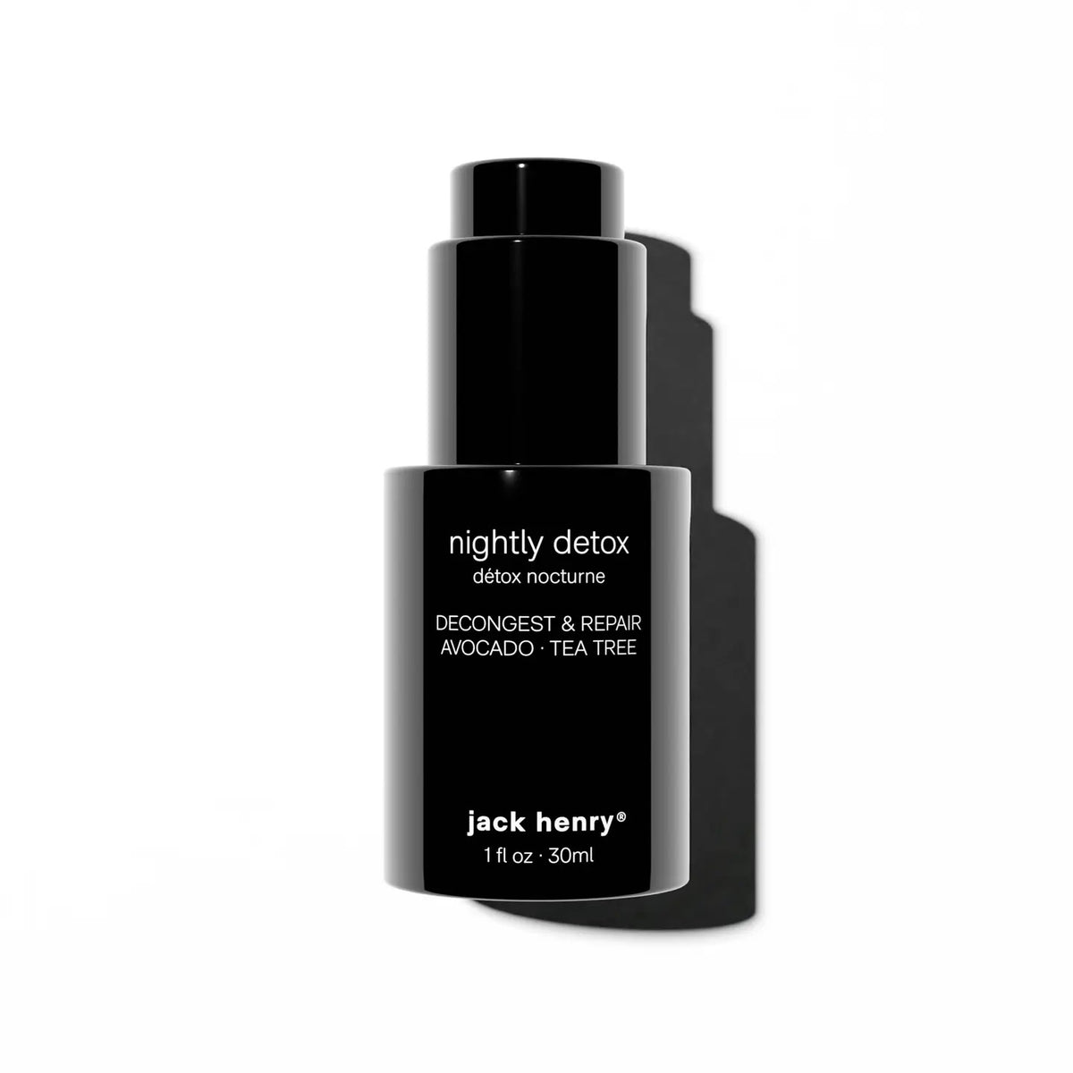 A 1 fl oz (30ml) black bottle of JACK HENRY - NIGHTLY DETOX night-time moisturizer with avocado and tea tree oil, shown against a white background with shadow.