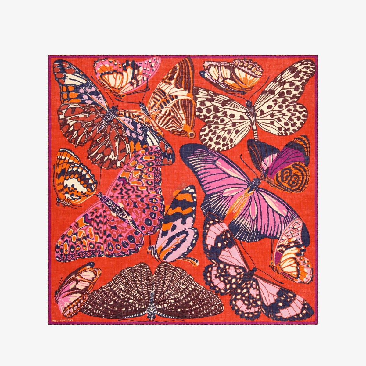 The INOUI EDITIONS PAPILLONS Square Wool Scarf in red features colorful butterflies in pink, orange, purple, and brown across a vibrant 130x130cm design—an eye-catching and versatile accessory for any occasion.