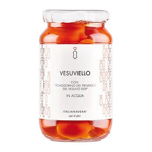 A jar of Italianavera Vesuvielo tomato sauce sits next to a bundle of VESUVIO PIENNOLO TOMATOES from ZIA PIA IMPORTS, tied together with twine on a rustic brown surface.