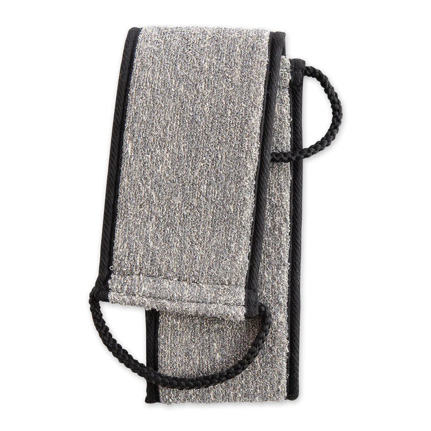 The BAMBOO CHARCOAL BACK SCRUBBER by EUROPEAN SOAPS, LLC is a rectangular, grey synthetic cleaning cloth with black trim. It is folded over and features black looped handles on both ends for an easy grip during use. The texture of the cloth appears to be suitable for gentle cleaning or polishing dead skin cells away.