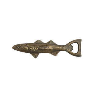 The FISH SHAPED BOTTLE OPENER by CREATIVE COOP is a coastal-inspired accessory with an antique gold finish, showcasing intricate scale patterns on its body, fins, and tail. It features a horizontally oriented design where the tail fin serves as the functional opener, with its head facing left.