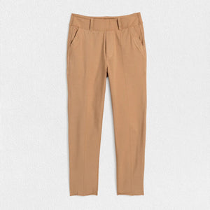 The FRANK & EILEEN - MURPHY BILLION DOLLAR PANT is showcased against a white background. These beige trousers feature a mid-rise fit, belt loops, front pockets, and a seam detail running down the center of each leg. The overall design is both simple and classic.