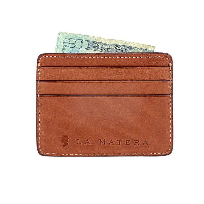 The LA MATERA - CORBINA CARD WALLET features a square vegetable-tanned leather patch with white Argentine woven fabric, a navy blue geometric diamond pattern at the center, and tan stitching around the edges.