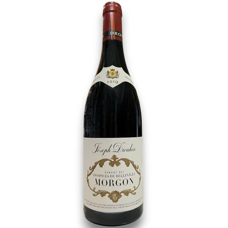 A 2019 bottle of DROUHIN HOSPICE DE BELLEVILLE MORGON BEAUJOLAIS from WINE: GRAPEVINE, made with Gamay grapes. The cream label with gold accents reads &quot;Hospices de Belleville Morgon.&quot; Ideal for Burgundy wine lovers.