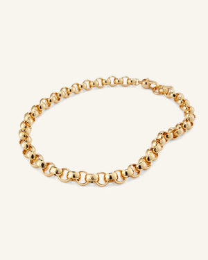 The JENNYBIRD RODIN NECKLACE is a high-polish gold rolo chain with interlocking round links arranged in an elegant circular pattern, beautifully showcased on a light background.