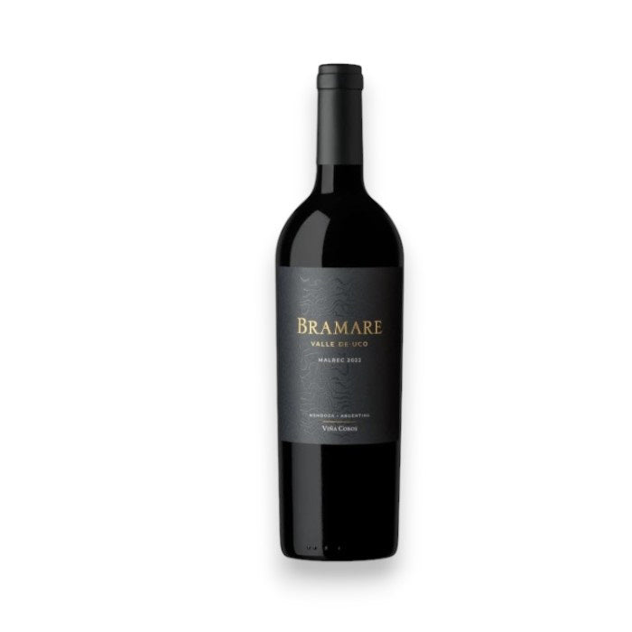 A bottle of VIÑA COBOS &#39;BRAMARE&#39; MALBEC 2022 from Argentina&#39;s Uco Valley. The label is dark with gold and white text, featuring a minimalist design, and the classic-shaped dark glass bottle reflects its Mendoza heritage. Brand: WINEBOW.