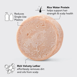 Image of a pinkish-beige solid shampoo bar resting on top of its rectangular white packaging box. The text on the box reads "KITSCH, STRENGTHENING Shampoo Bar, RICE WATER PROTEIN SHAMPOO BAR FOR HAIR GROWTH, For Healthier-Looking Hair, Color Safe, pH Balanced, Vegan, 3.2 oz (91g)." Ideal for damaged hair.