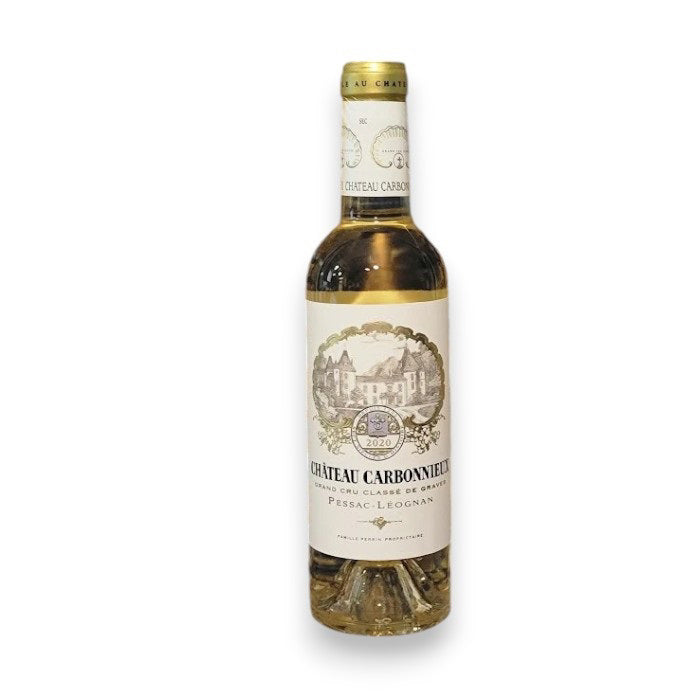 A 375ml bottle of CHATEAU CARBONNIEUX by Monsieur Touton, vintage 2020, from Pessac-Léognan&#39;s Graves region features a gold foil and a detailed label with a chateau illustration and traditional winemaking motifs.