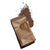 A crumpled brown paper bag lies on a white surface with coffee grounds spilling out of it. The espresso fragments gather in a small pile beside the bag, evocative of how RITUAL CHOCOLATE - ONE HUNDRED PERCENT DRINKING CHOCOLATE shavings might scatter when unwrapped.