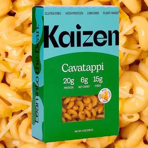 A box of KAIZEN - CAVATAPPI PASTA by KAIZEN FOOD COMPANY is shown. The packaging highlights that the pasta is gluten-free, high in protein, low in carbs, and plant-based. Nutritional information on the front indicates it has 20g of protein, 6g of net carbs, and 15g of fiber per serving.